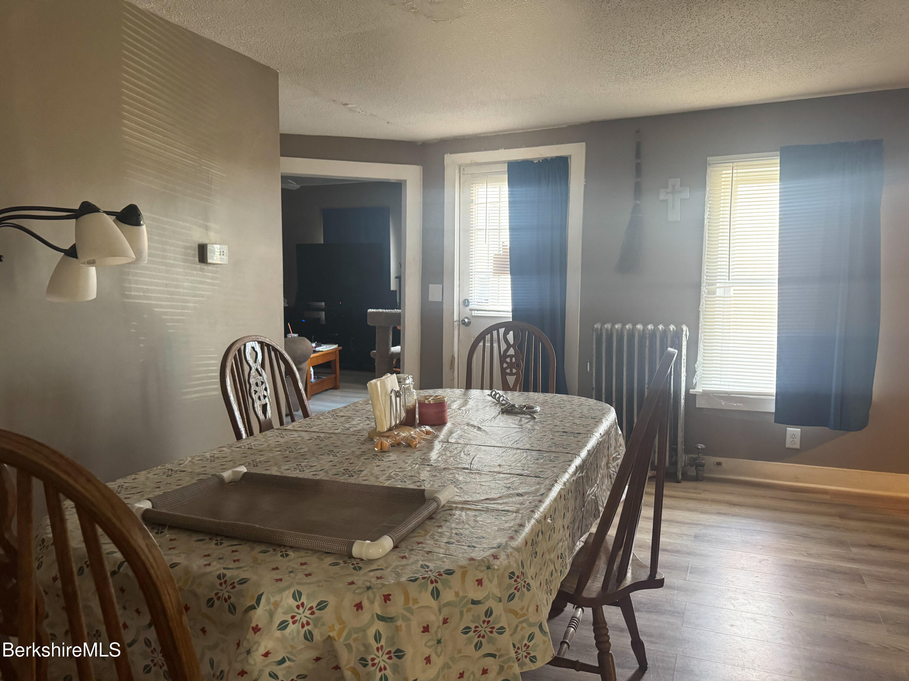 21 Pleasant Street Pittsfield, MA 01201 - Photo 3 of 16 a dining room with furniture and wooden floor