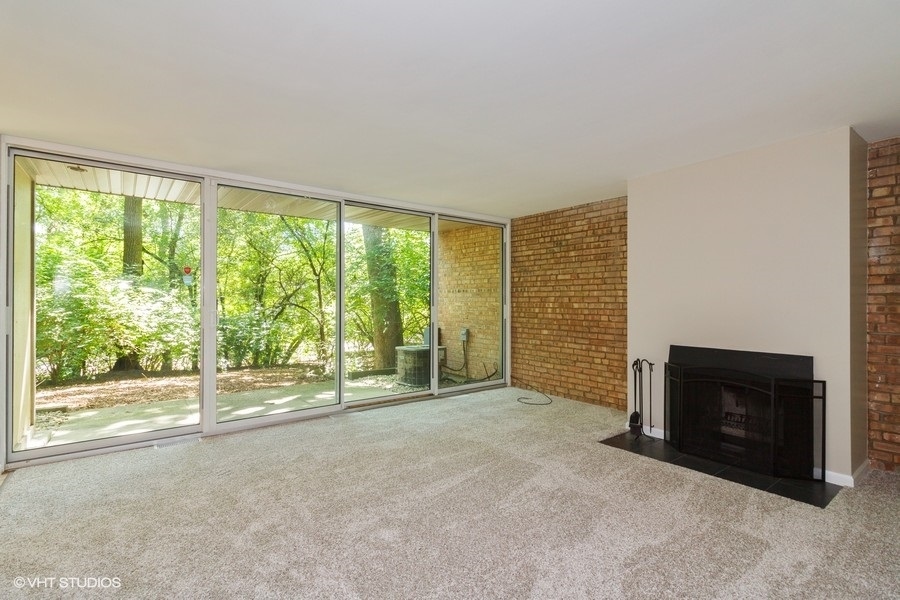 6008 Forest View Road, Unit 1D Lisle, IL 60532 - Photo 2 of 22 a view of empty room with front door