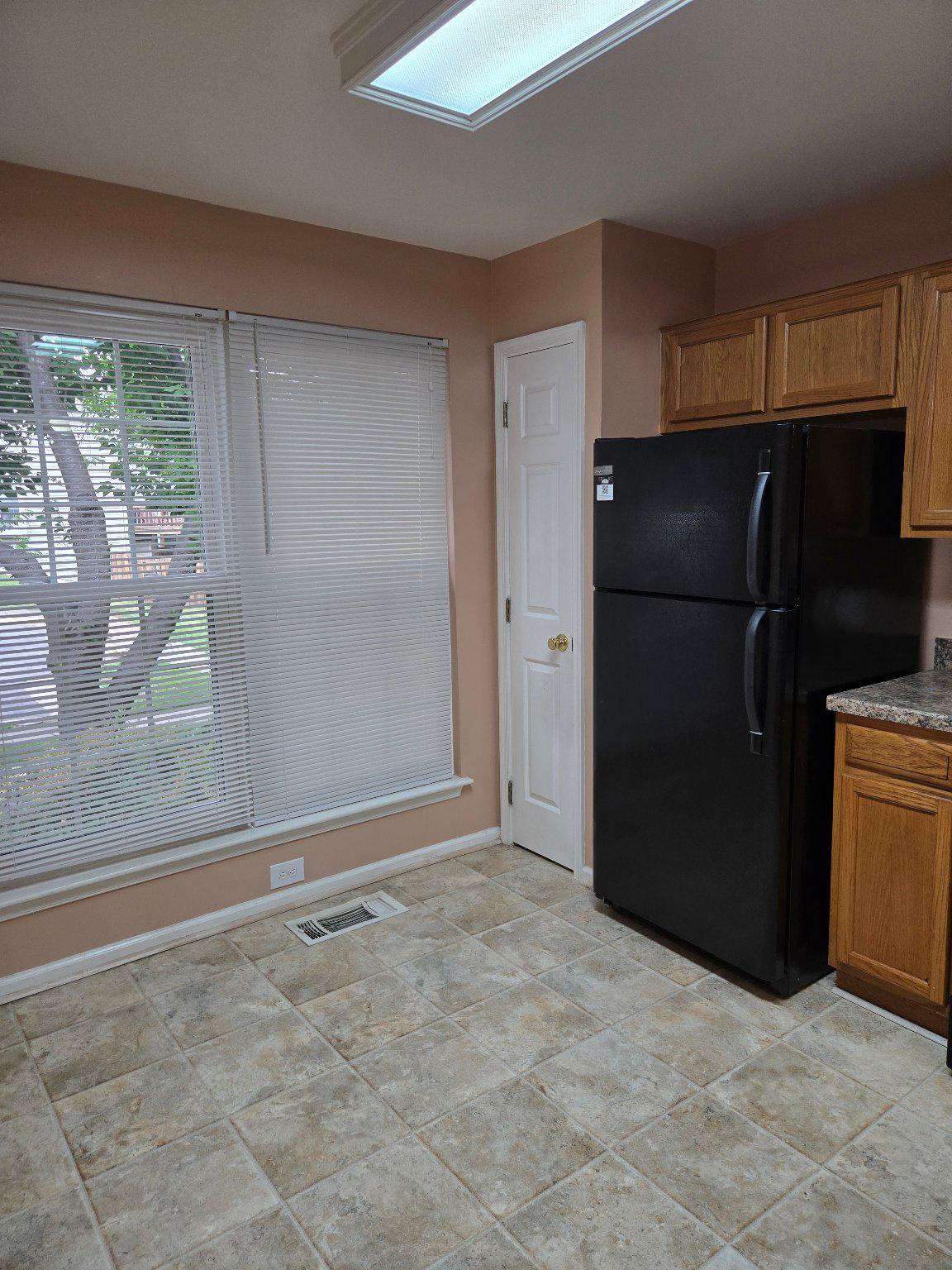 1765 Rochelle Court Woodbridge, VA 22192 - Photo 5 of 34 Bright kitchen with warm wood cabinetry.