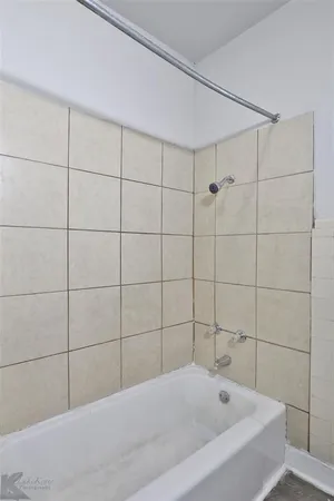 a bathroom with a bathtub