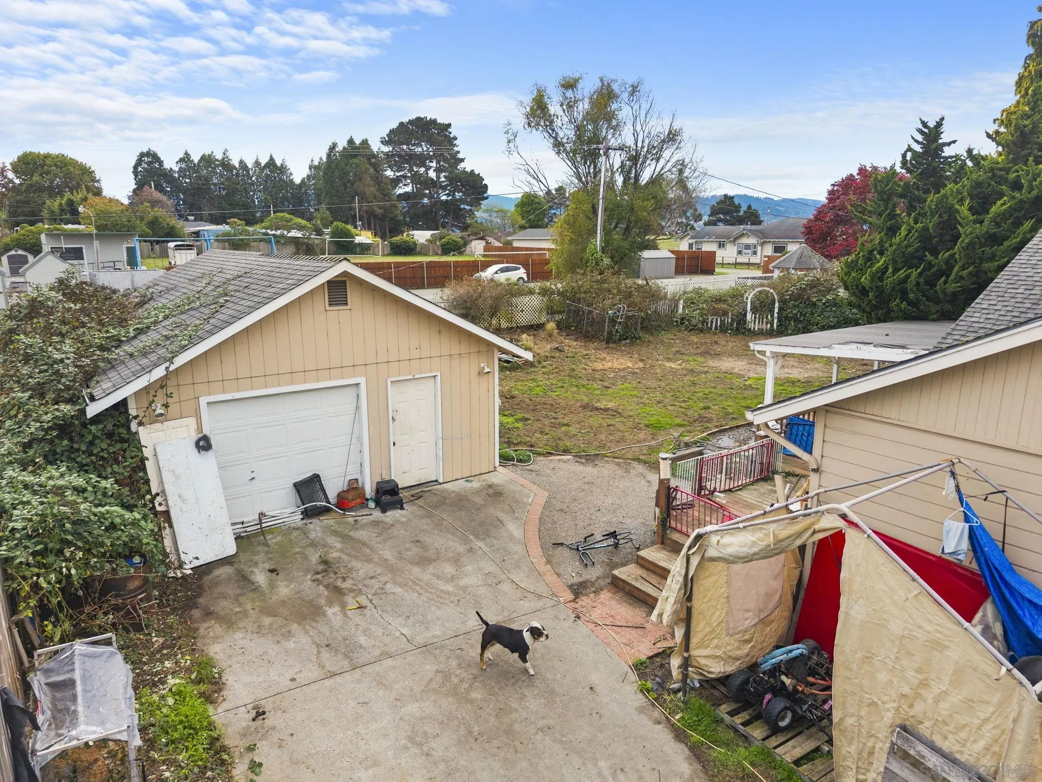 1297 Atterberry Lane Fortuna, CA 95540 - Photo 12 of 17 a view of house with backyard space and seating area