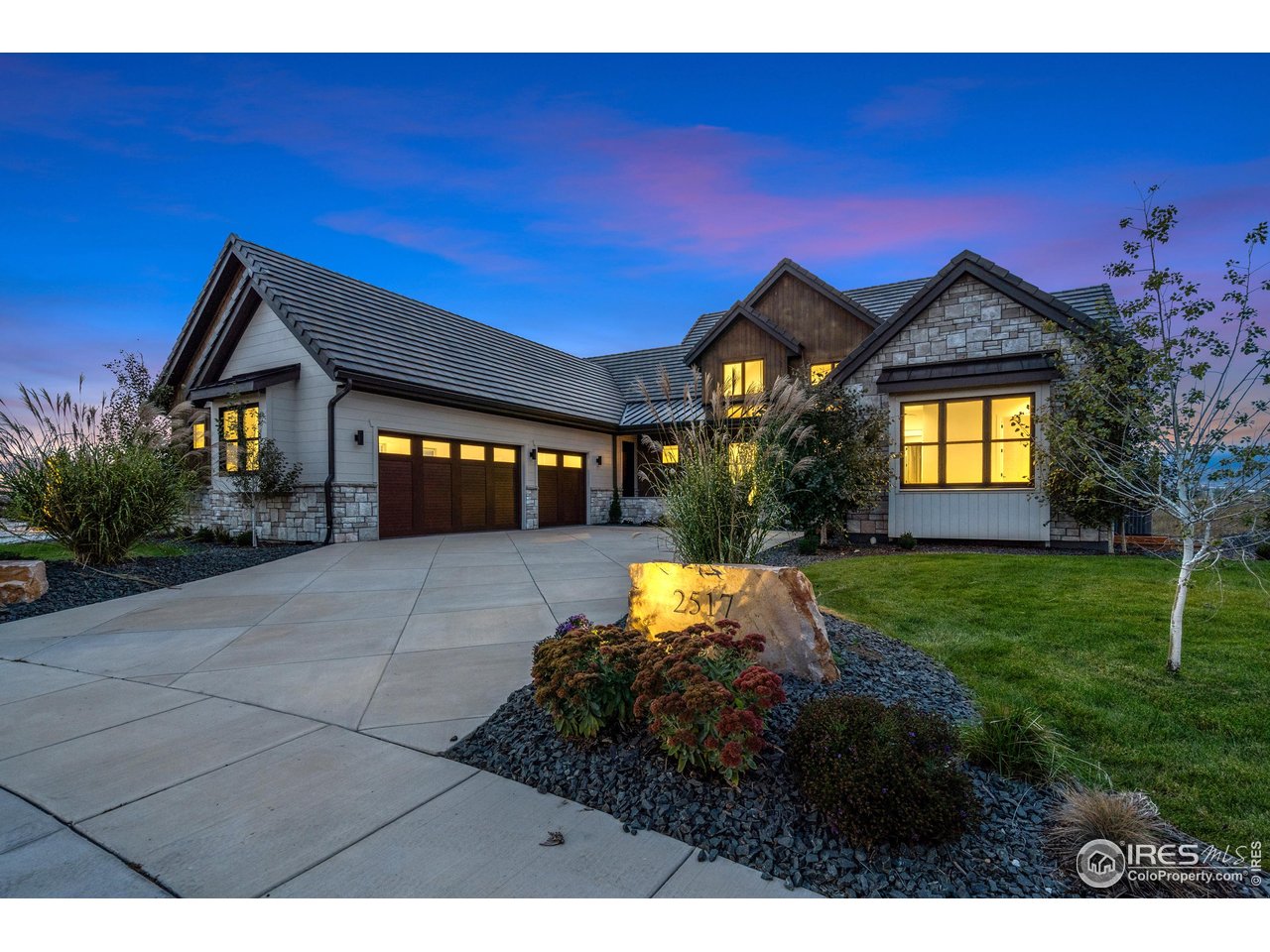 2517 Southwind Road Berthoud, CO 80513 - Photo 2 of 50 An architectural showpiece, this home blends stone, timber, and light into an inviting presence designed for elevated mountain living and unforgettable evenings.