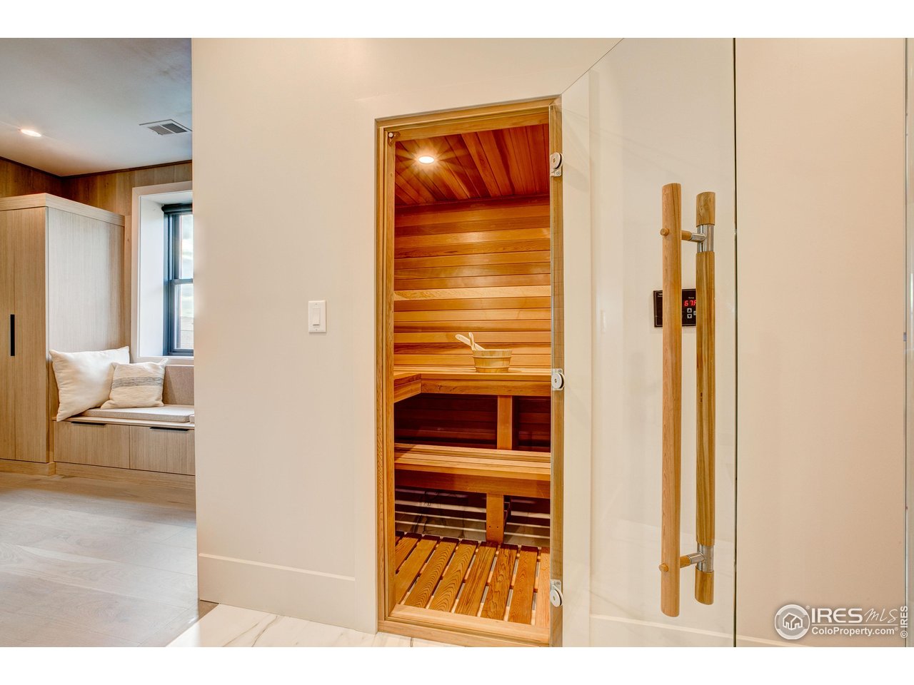 2517 Southwind Road Berthoud, CO 80513 - Photo 27 of 50 Designed with today's leading wellness trends in mind, this portion of the home is ideally suited for hot-and-cold therapy, allowing for an effortless sauna-to-cold plunge or cold shower experience at home.