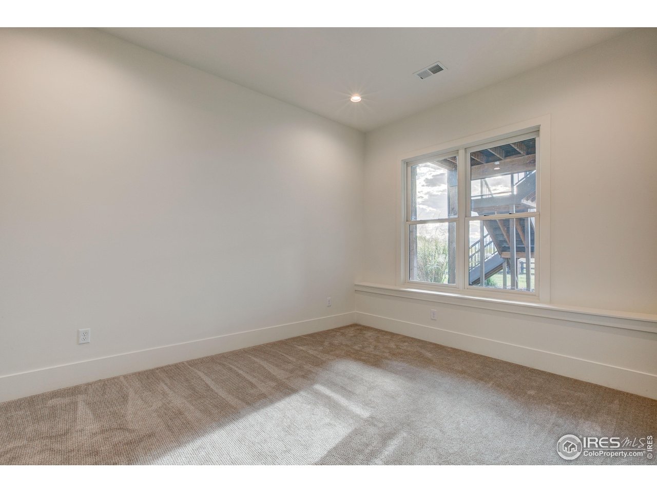 2517 Southwind Road Berthoud, CO 80513 - Photo 31 of 50 Bedroom 3 in basement w/ dedicated bathroom & a walk-in closet.