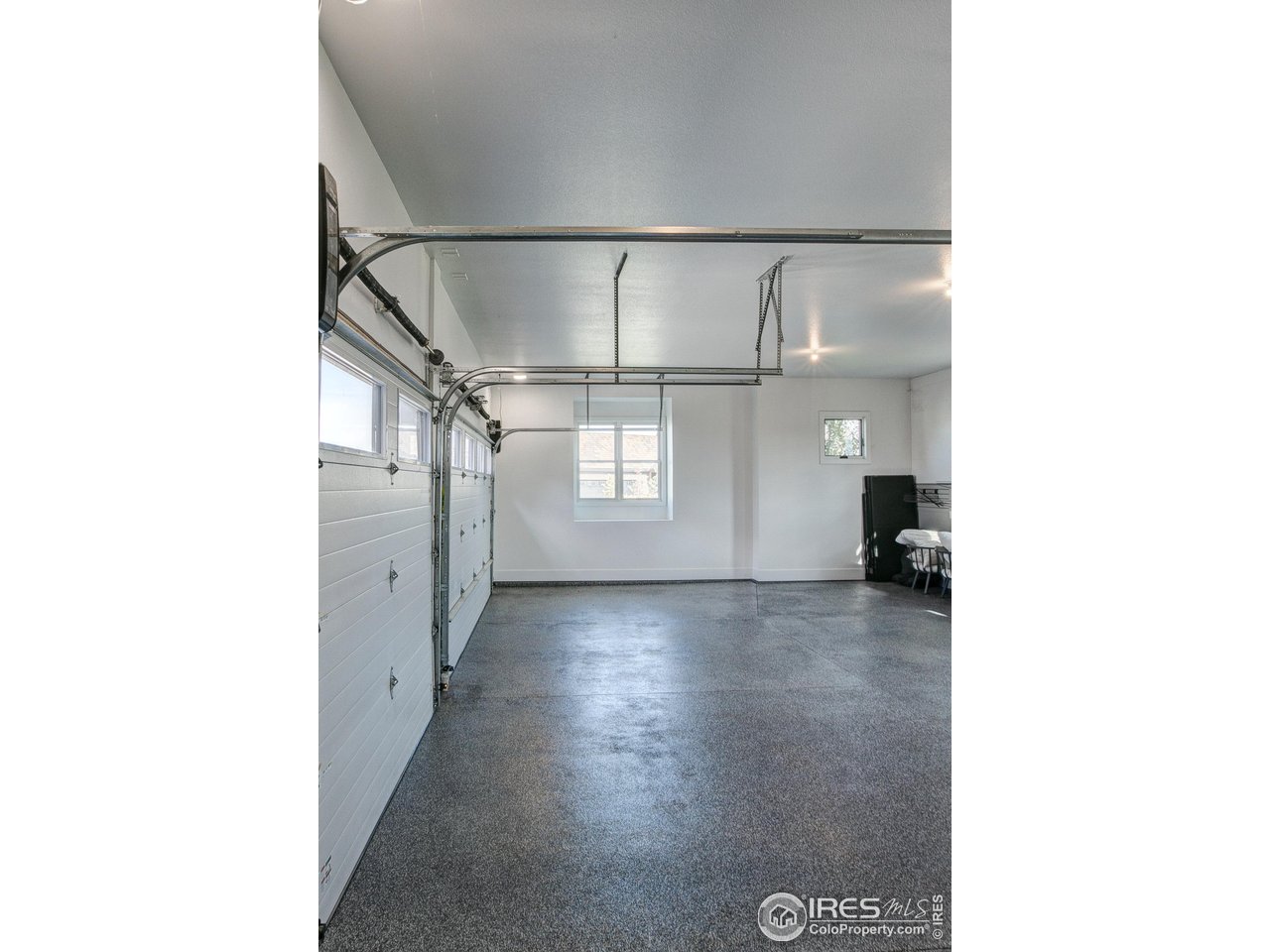 2517 Southwind Road Berthoud, CO 80513 - Photo 40 of 50 Oversized 3-car garage with epoxy flooring.