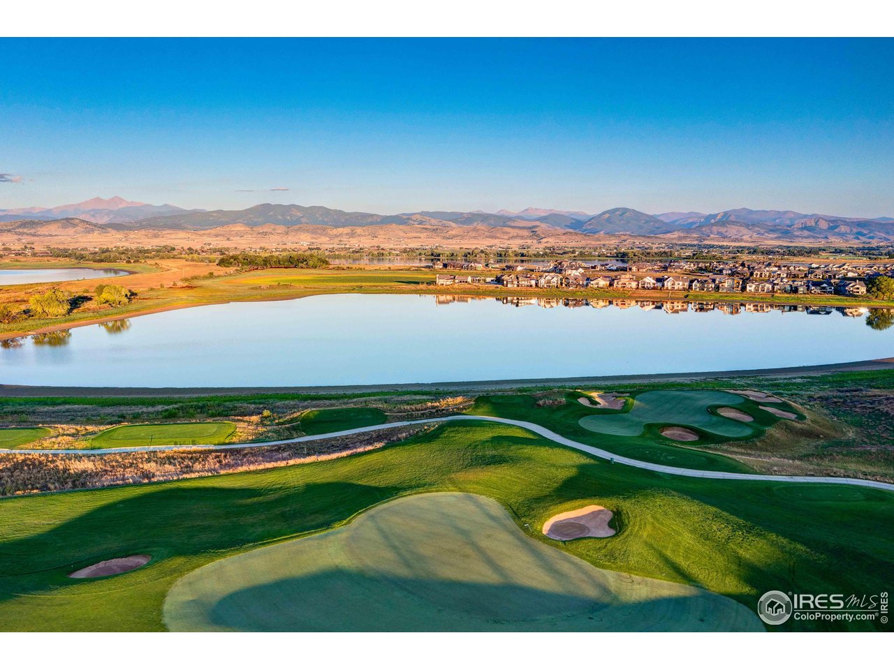 2517 Southwind Road Berthoud, CO 80513 - Photo 41 of 50 Set within the breathtaking TPC golf community, this home is surrounded by championship fairways, shimmering lakes, and panoramic mountain views, with resort-style amenities.
