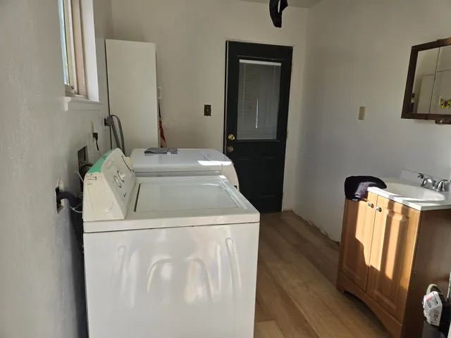a utility room with dryer and washer