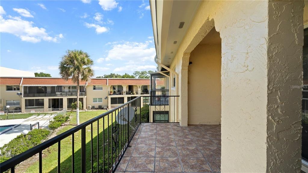 106 West San Sebastian Court, Unit 106 Altamonte Springs, FL 32714 - Photo 10 of 11 a view of balcony with furniture