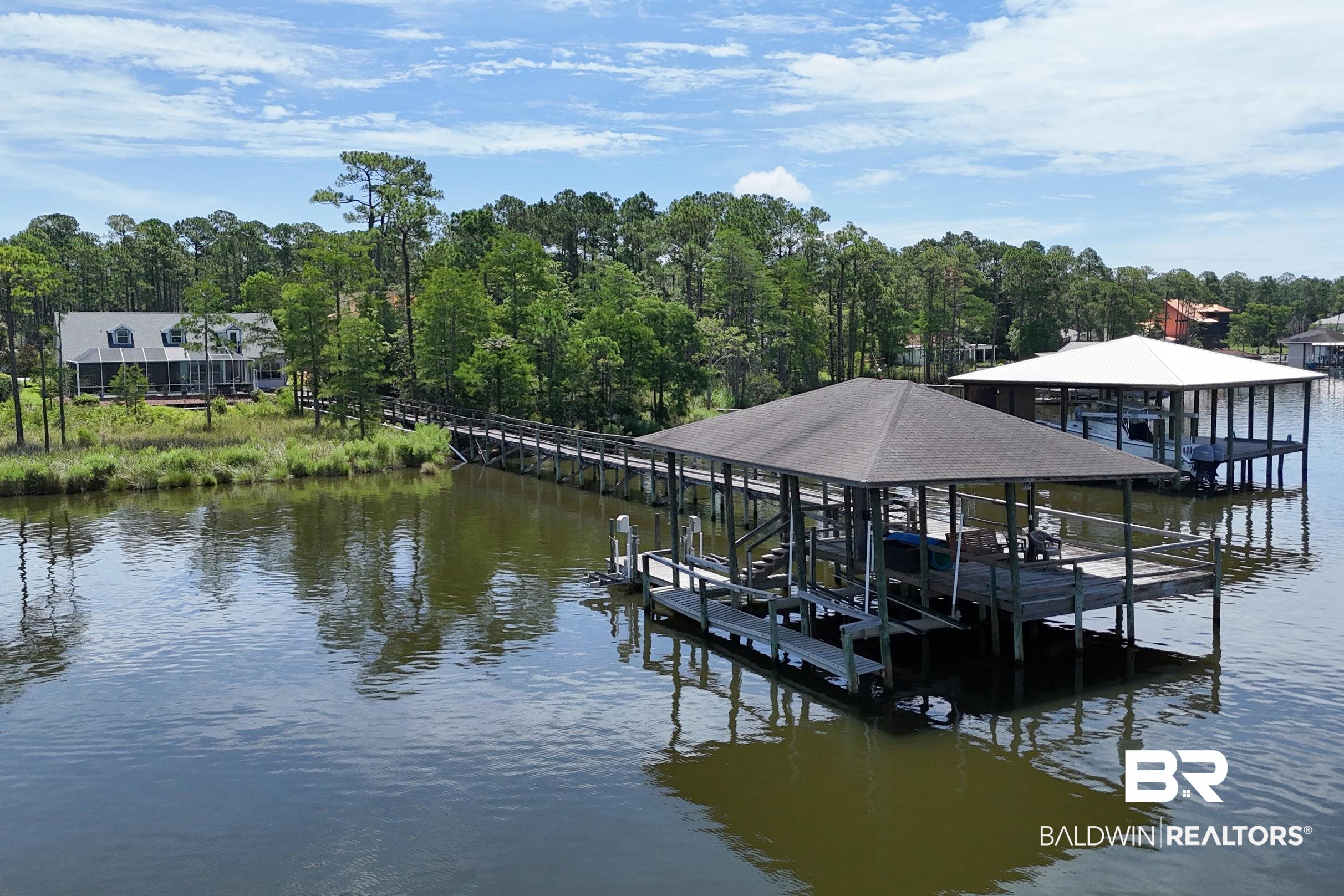 8585 Bay Harbor Road Elberta, AL 36530 - Photo 45 of 51 Dock with boat lift and a water view