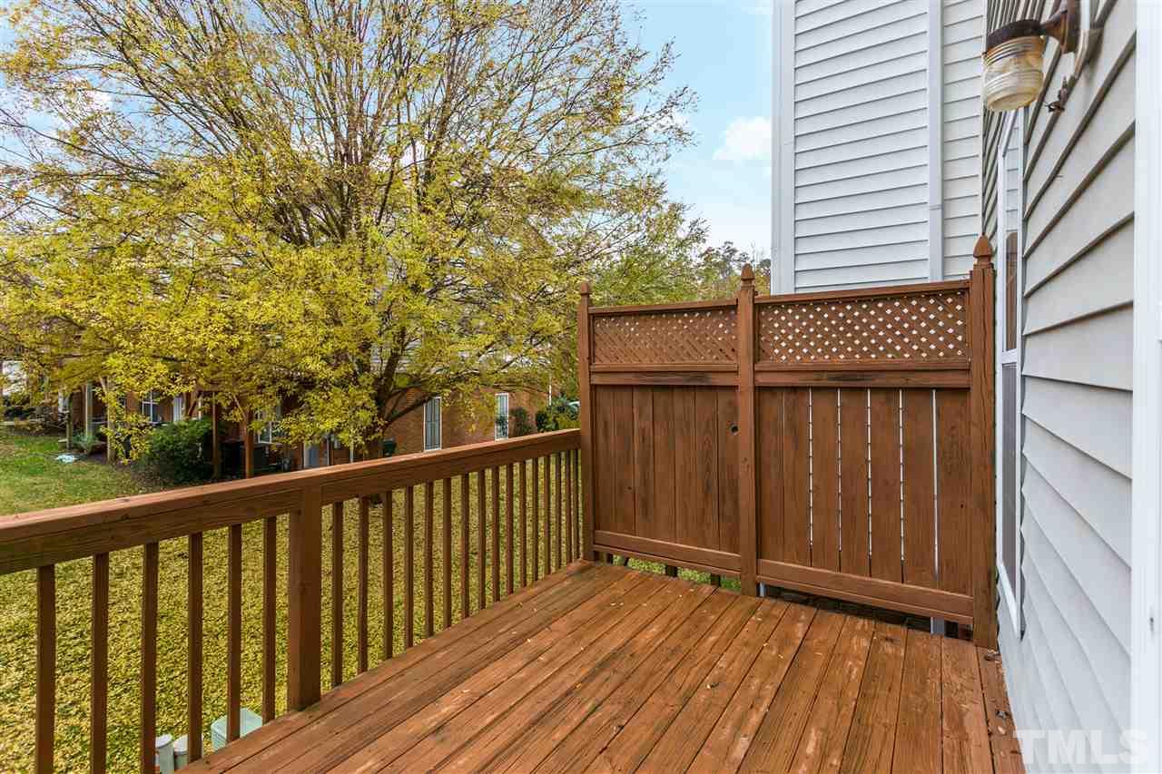 5505 Red Robin Road Raleigh, NC 27613 - Photo 16 of 19 a view of balcony with wooden floor and fence