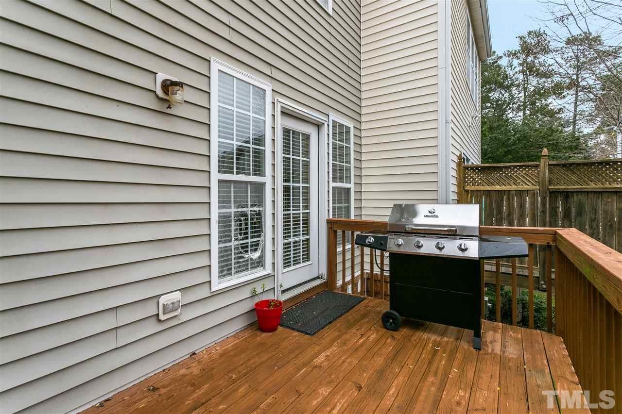 5505 Red Robin Road Raleigh, NC 27613 - Photo 17 of 19 a view of balcony with wooden floor and seating space