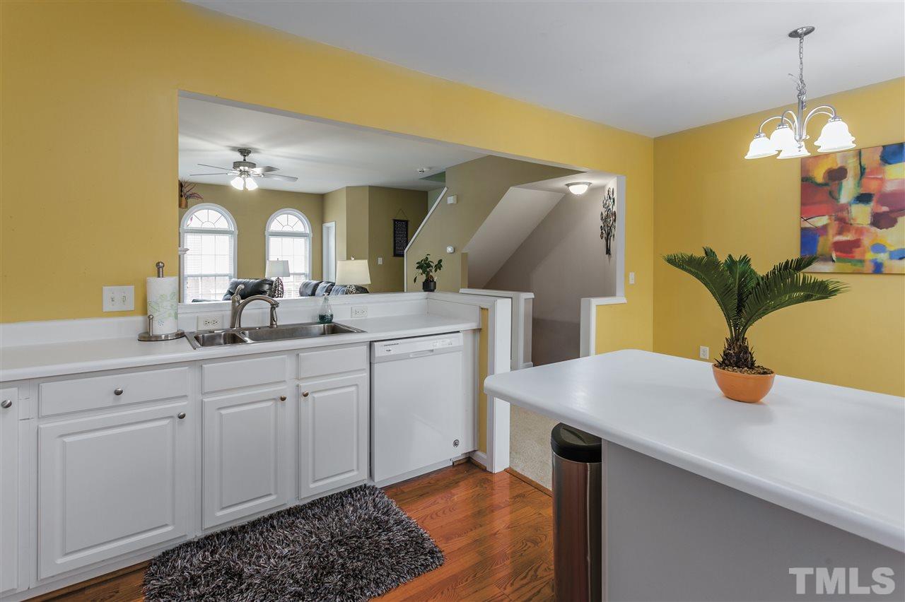 5505 Red Robin Road Raleigh, NC 27613 - Photo 5 of 19 a bathroom with a sink and a mirror