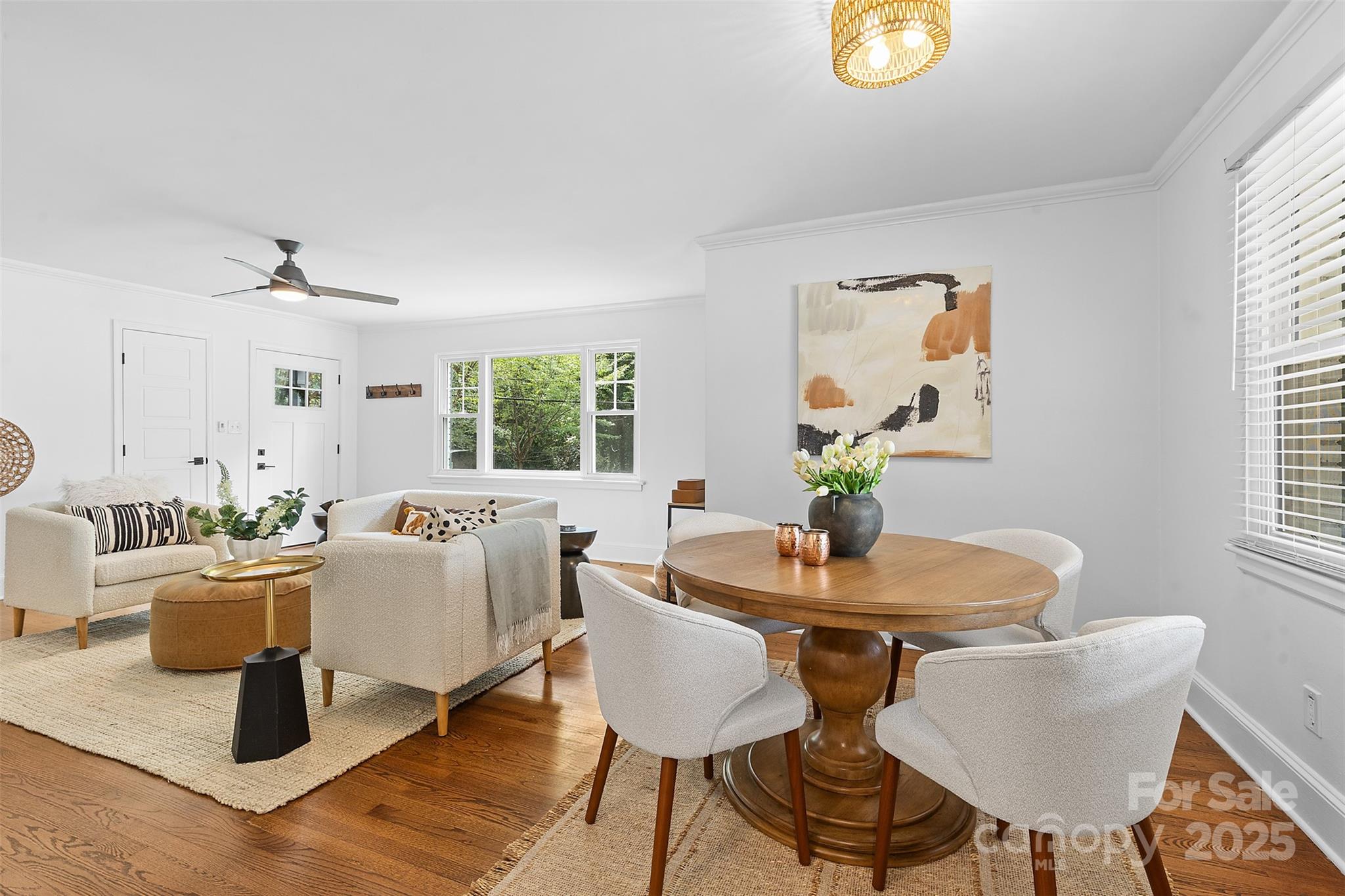 917 Scaleybark Road Charlotte, NC 28209 - Photo 11 of 42 a dining room with furniture and wooden floor