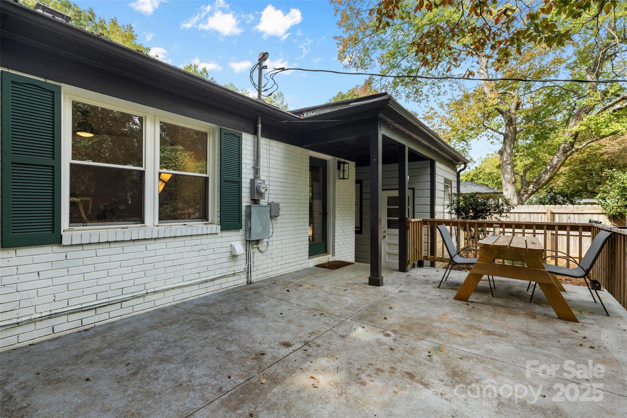 917 Scaleybark Road Charlotte, NC 28209 - Photo 30 of 42 a view of a house with backyard porch and sitting area
