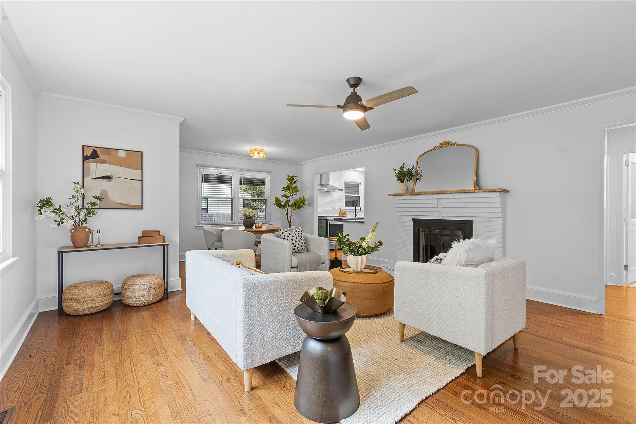 917 Scaleybark Road Charlotte, NC 28209 - Photo 3 of 42 a living room with furniture and a fireplace