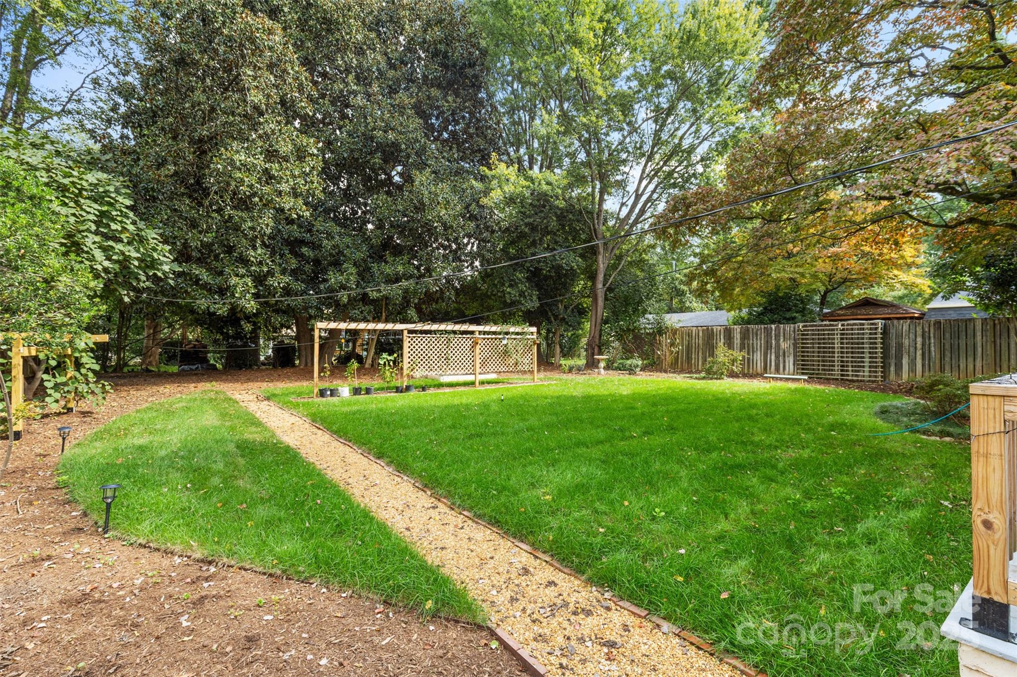 917 Scaleybark Road Charlotte, NC 28209 - Photo 31 of 42 a front view of a house with garden