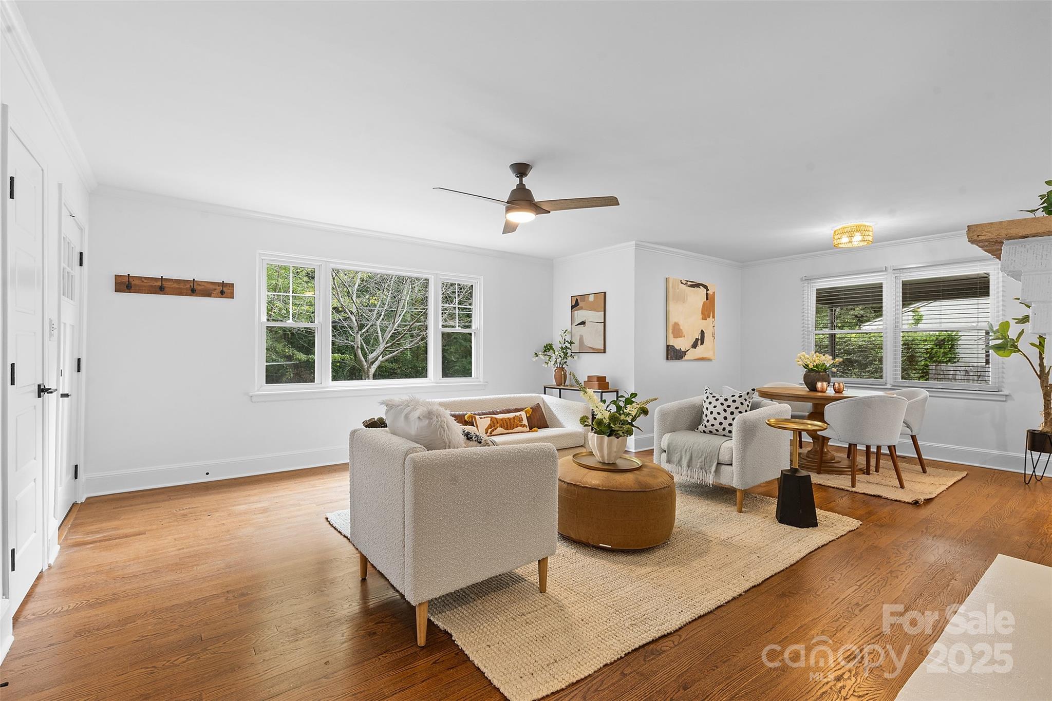 917 Scaleybark Road Charlotte, NC 28209 - Photo 4 of 42 a living room with furniture window and wooden floor