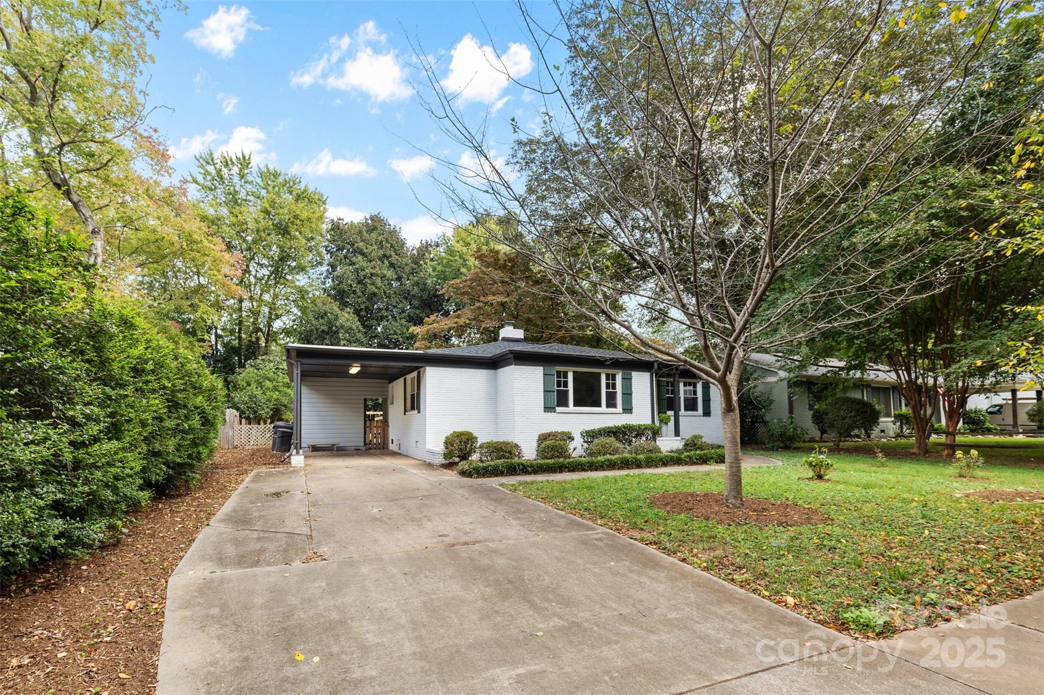 917 Scaleybark Road Charlotte, NC 28209 - Photo 41 of 42 a front view of a house with garden