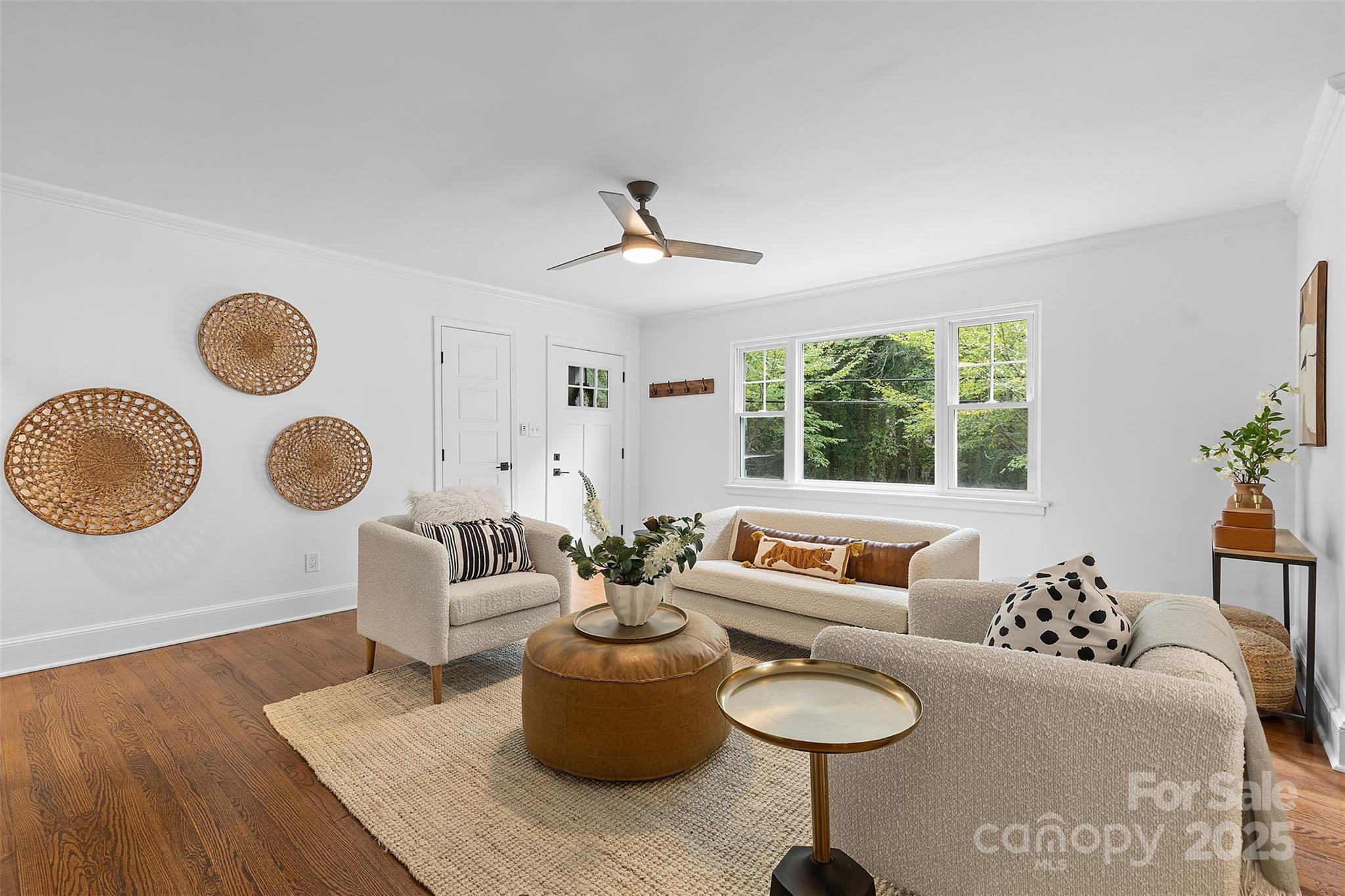 917 Scaleybark Road Charlotte, NC 28209 - Photo 5 of 42 a living room with furniture and a large window