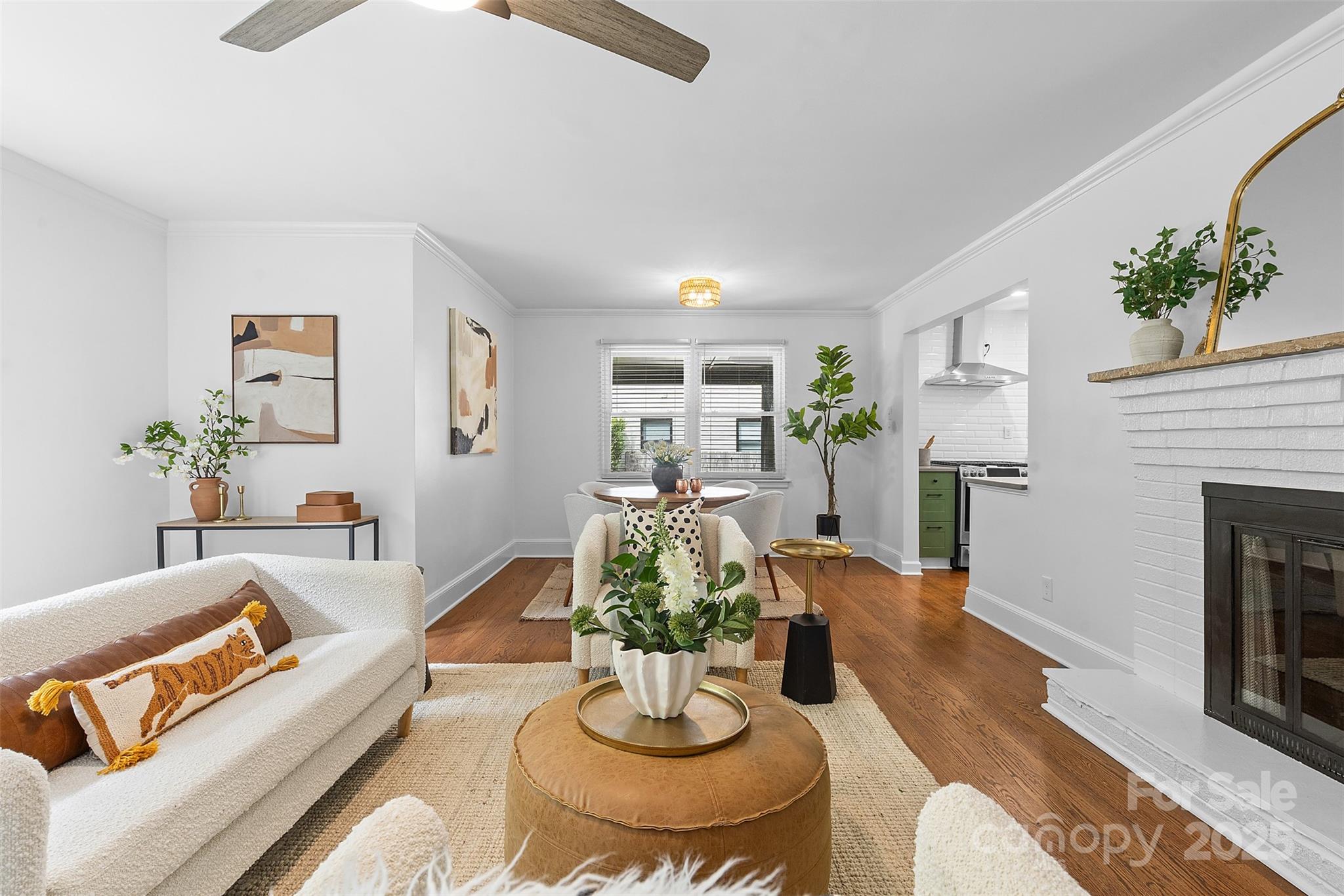 917 Scaleybark Road Charlotte, NC 28209 - Photo 8 of 42 a living room with fireplace furniture and a fireplace