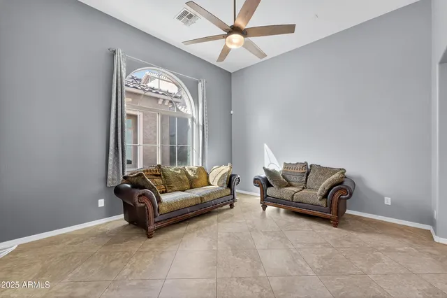 a living room with furniture and a couch