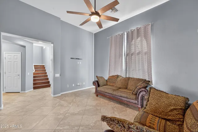 a kitchen with stainless steel appliances granite countertop a sink stove and microwave