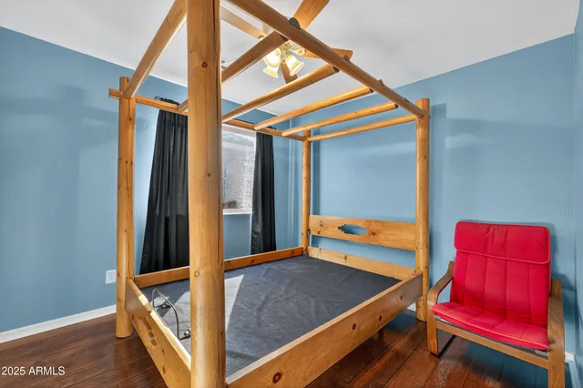 a view of room with hardwood floor