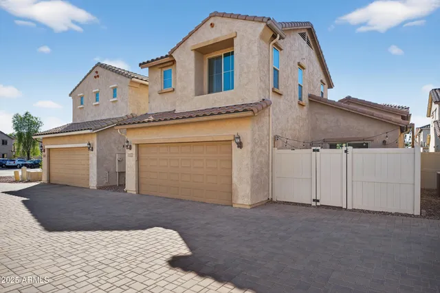 a view of a house with a garage