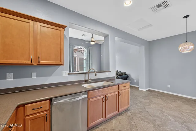 a view of hallway with wooden floor