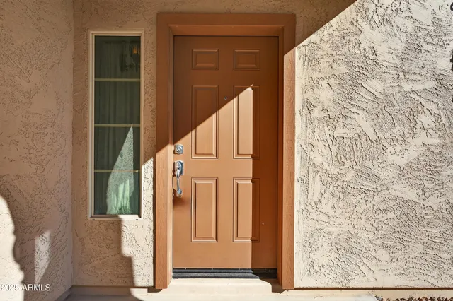 a front view of a house with a garage