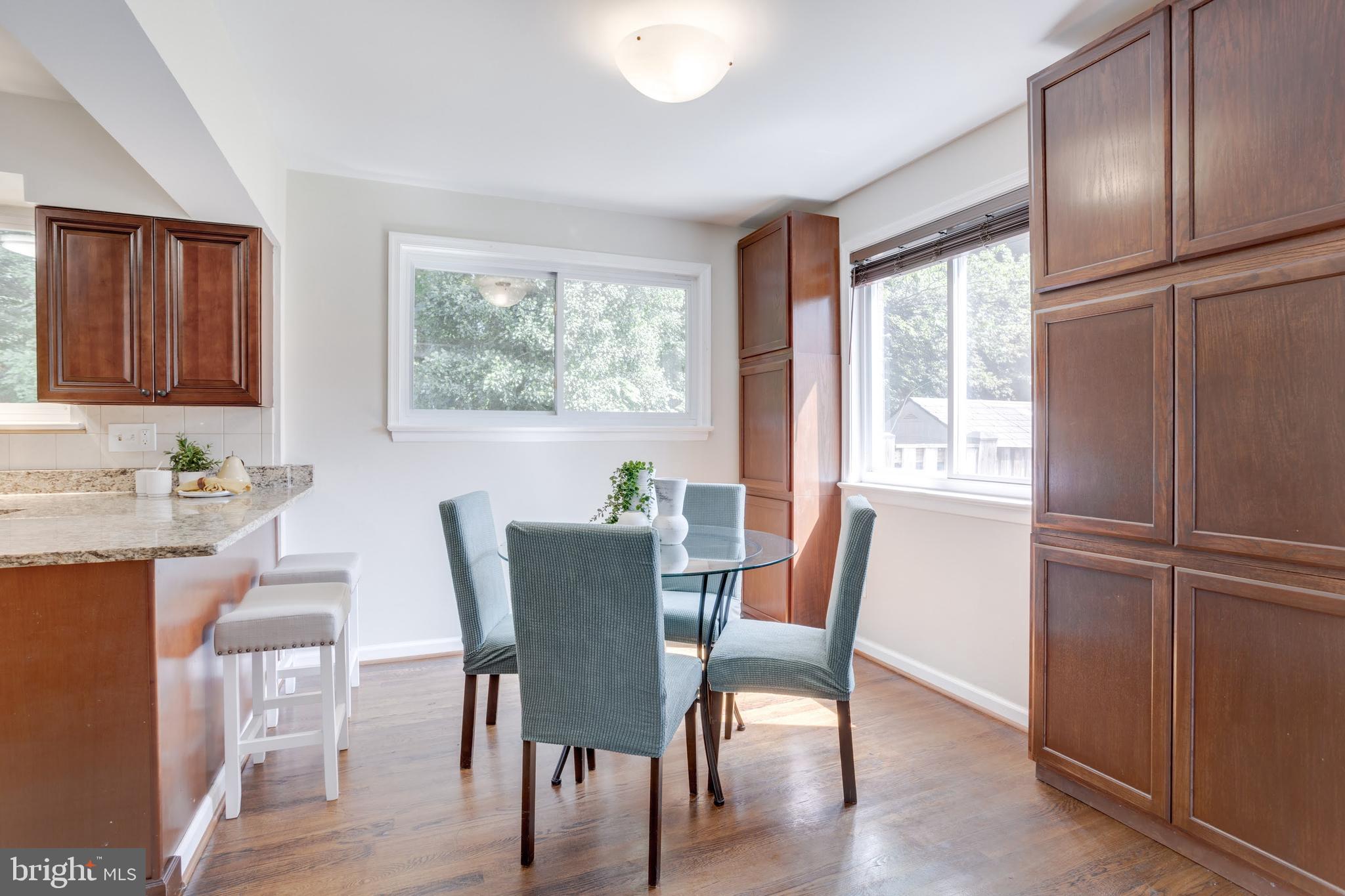 7424 Nancemond Street Springfield, VA 22150 - Photo 20 of 59 a view of a dining room with furniture window and outside view