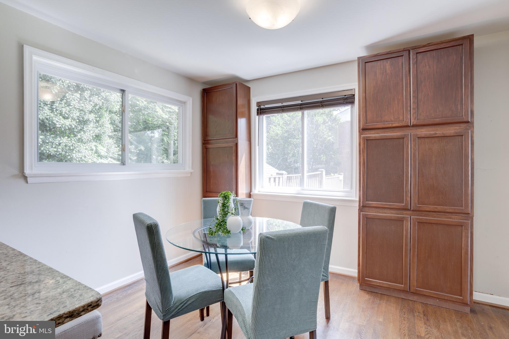 7424 Nancemond Street Springfield, VA 22150 - Photo 22 of 59 a workspace with furniture window and wooden floor