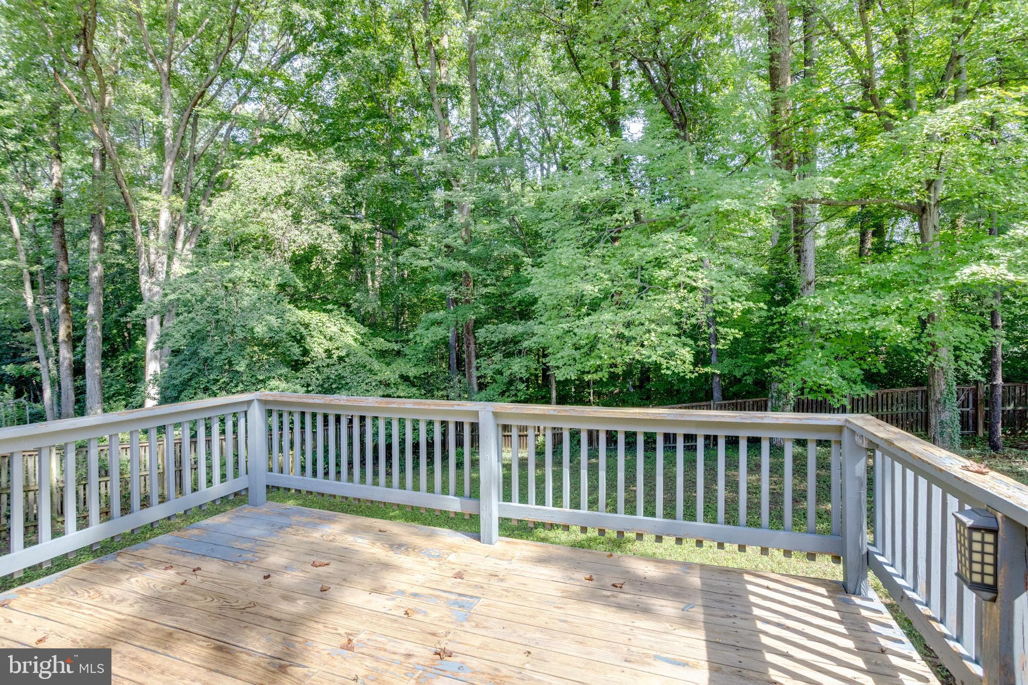 7424 Nancemond Street Springfield, VA 22150 - Photo 37 of 59 a view of a wooden roof deck