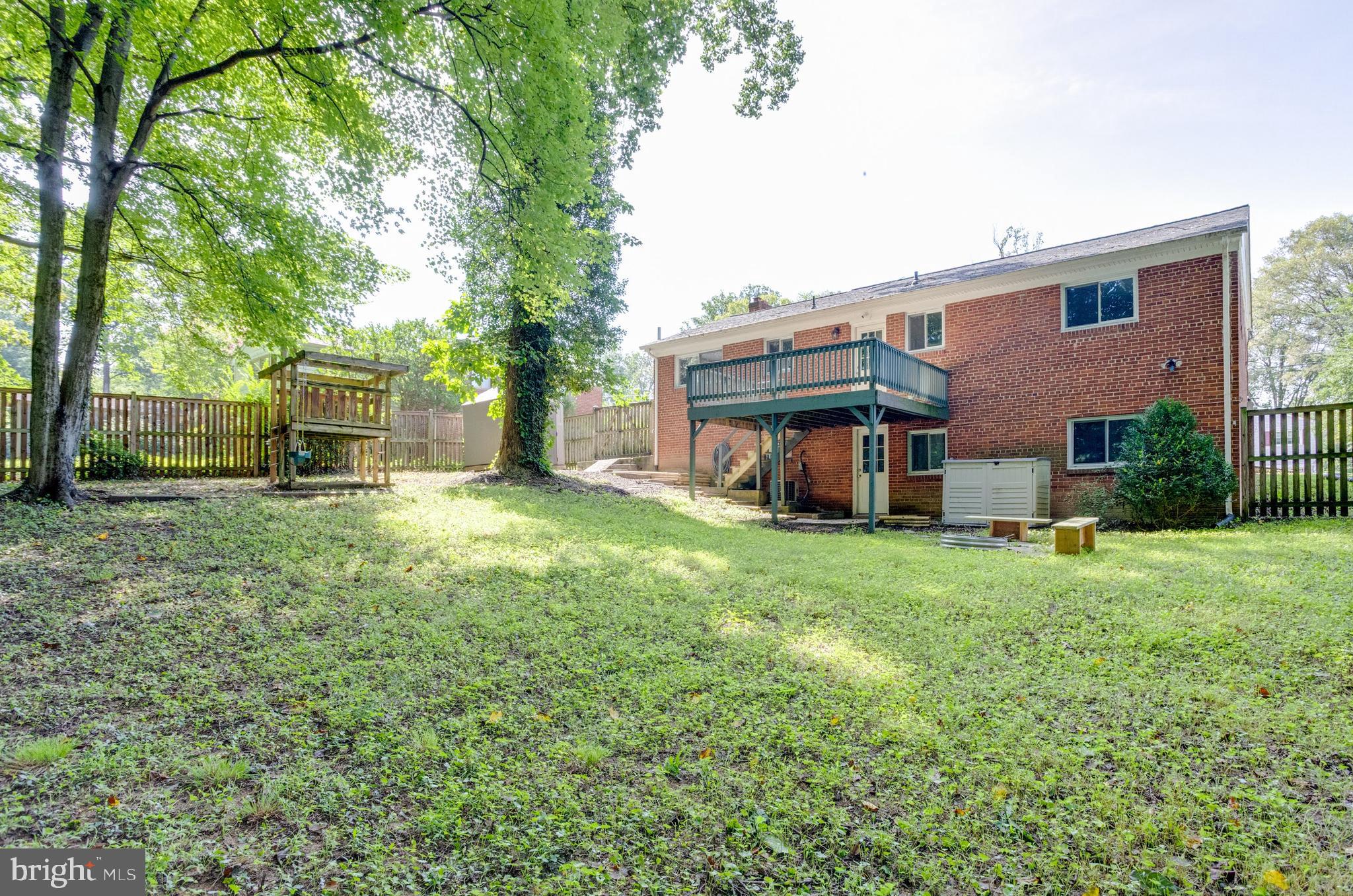 7424 Nancemond Street Springfield, VA 22150 - Photo 40 of 59 a view of a house with backyard and garden