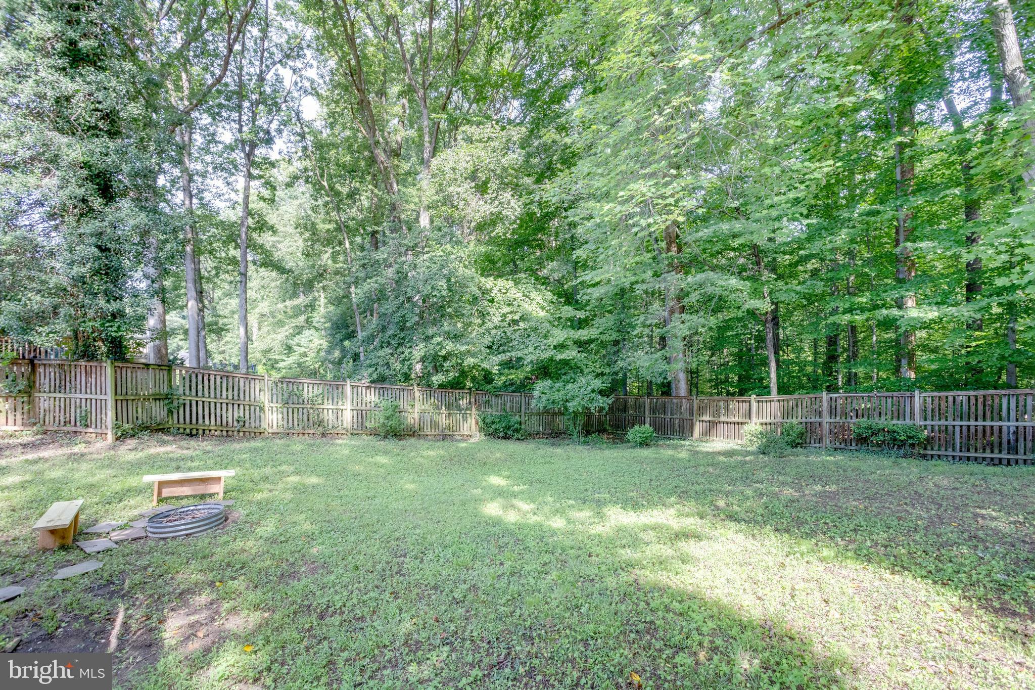 7424 Nancemond Street Springfield, VA 22150 - Photo 43 of 59 a view of a backyard with a small cabin