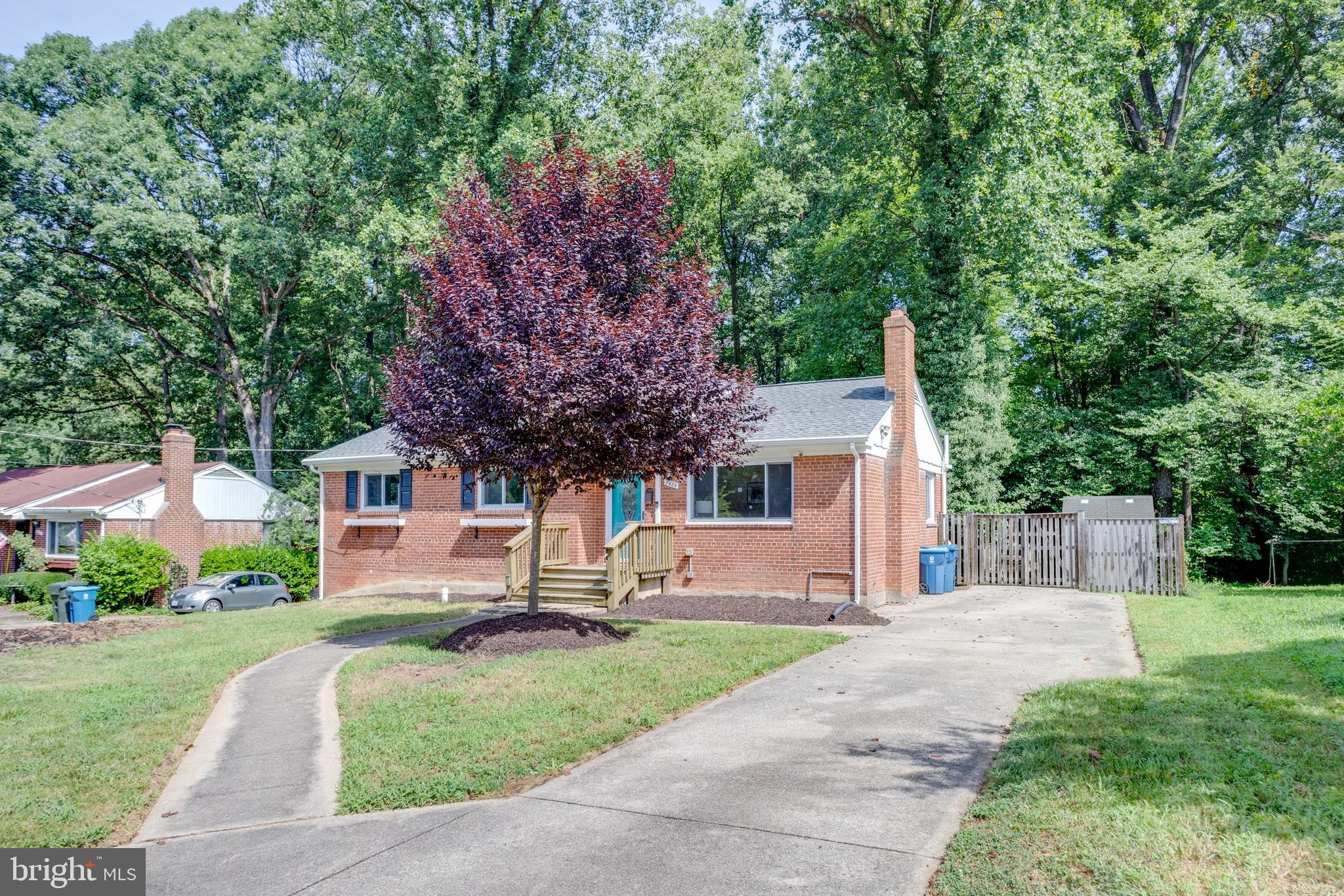 7424 Nancemond Street Springfield, VA 22150 - Photo 46 of 59 a front view of a house with garden