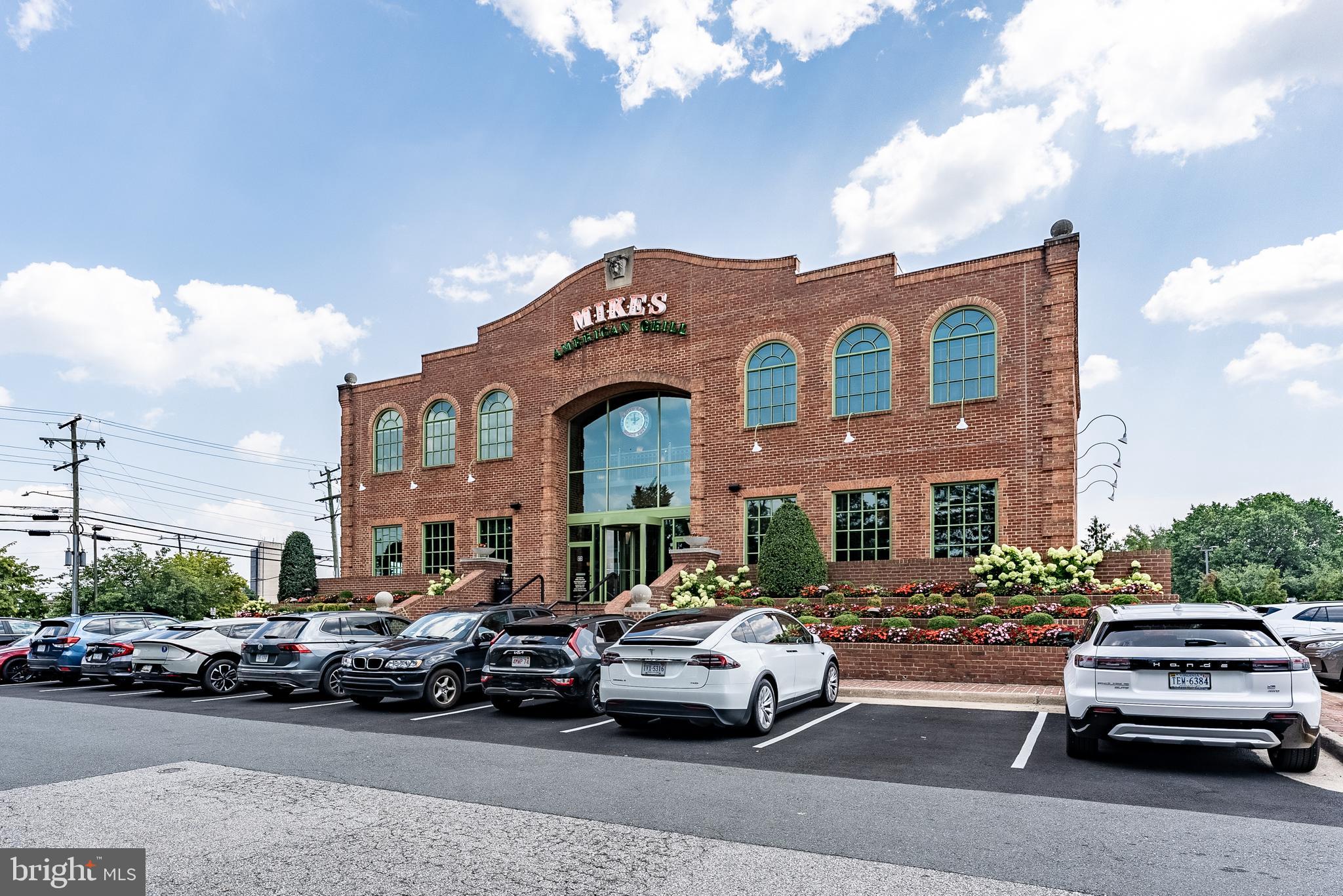 7424 Nancemond Street Springfield, VA 22150 - Photo 48 of 59 a view of a cars park in front of a building
