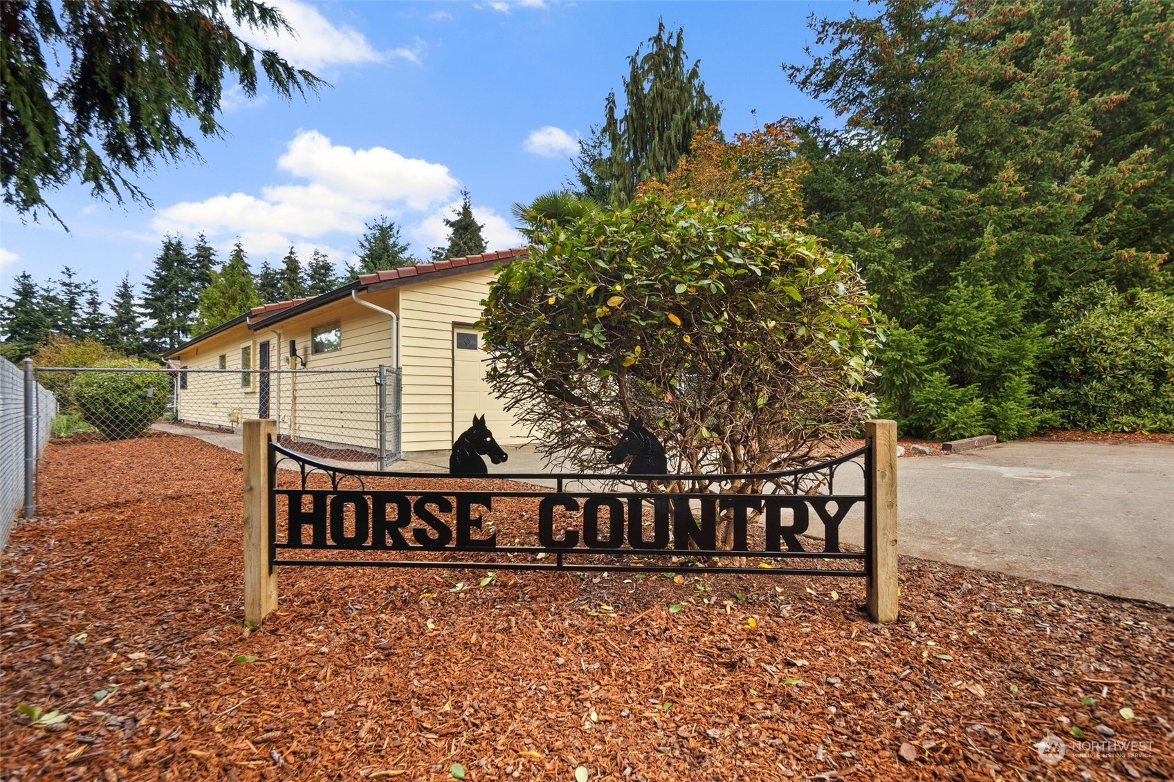 14844 Southeast 116th Street Renton, WA 98059 - Photo 2 of 38 a view of a house with wooden fence