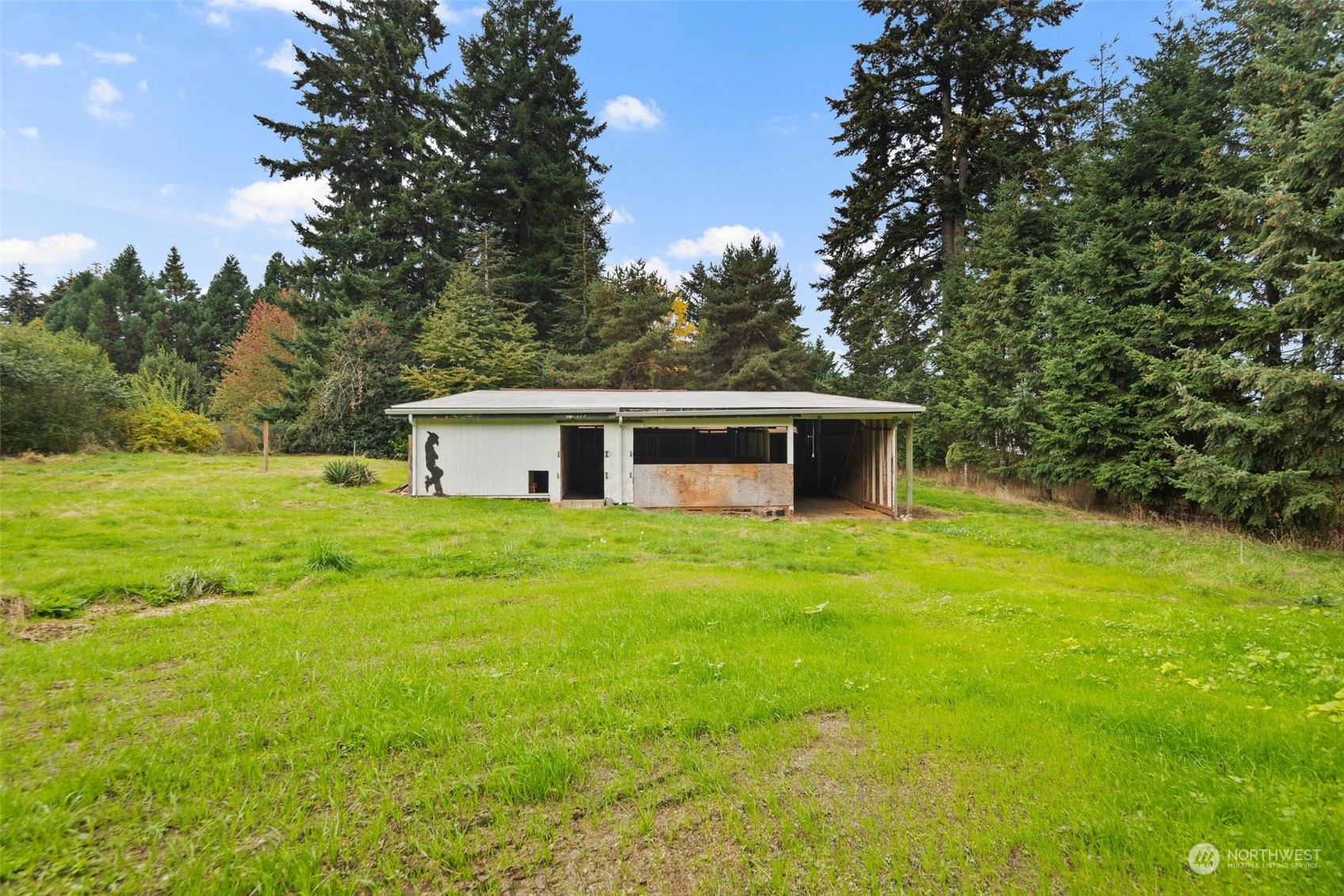 14844 Southeast 116th Street Renton, WA 98059 - Photo 26 of 38 a front view of a house with a yard