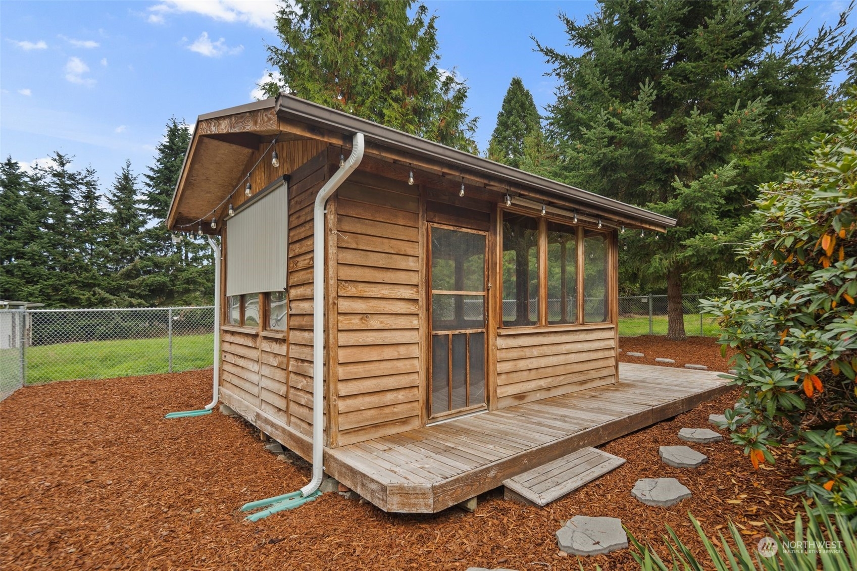 14844 Southeast 116th Street Renton, WA 98059 - Photo 30 of 38 a view of house with a yard