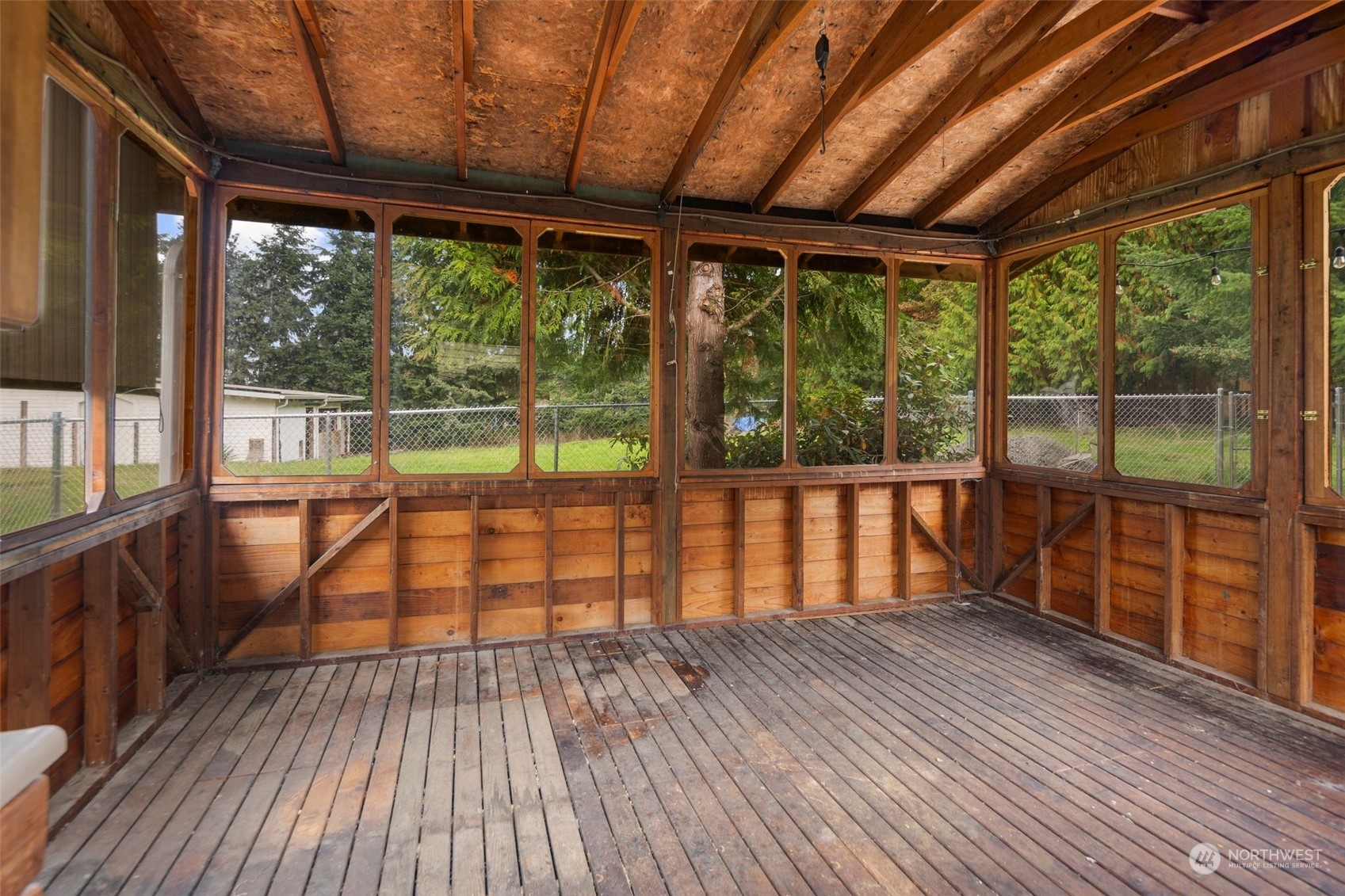 14844 Southeast 116th Street Renton, WA 98059 - Photo 31 of 38 a view of porch with wooden floor