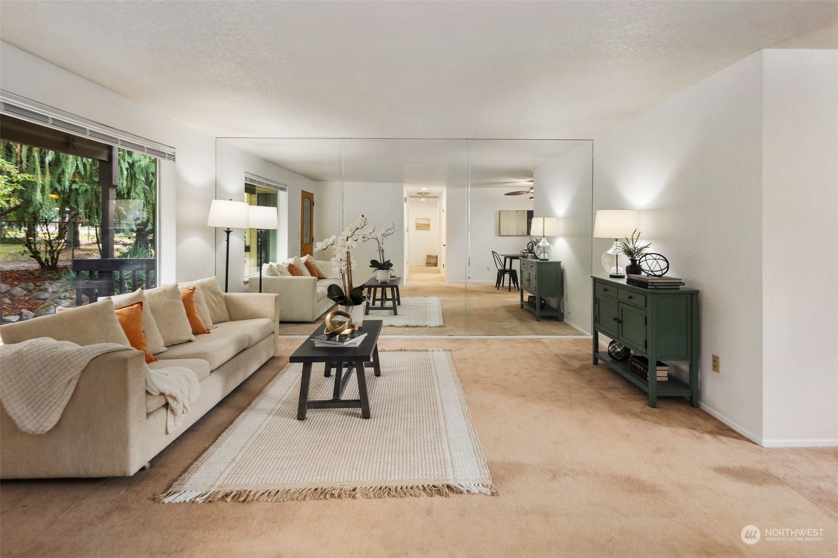 14844 Southeast 116th Street Renton, WA 98059 - Photo 6 of 38 a living room with furniture a chandelier and a large window