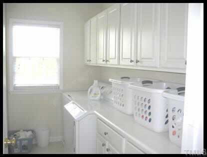 7616 Silver View Lane Raleigh, NC 27613 - Photo 7 of 10 2nd Floor Utility Room w/ lots of Storage Other