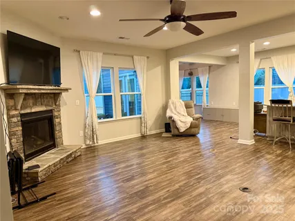 a living room with furniture or fireplace and a flat screen tv