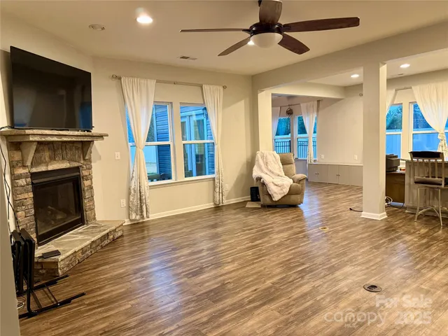 a living room with furniture or fireplace and a flat screen tv