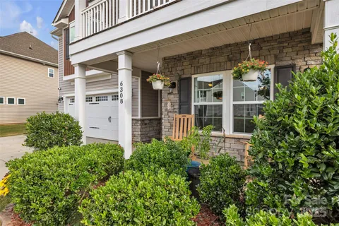 front view of a house with a small yard