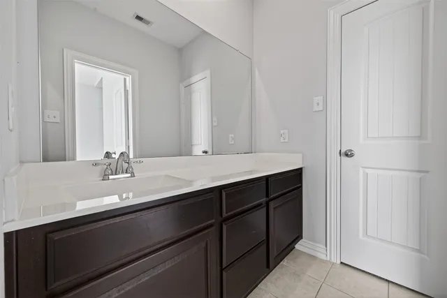 a white bath tub and a shower
