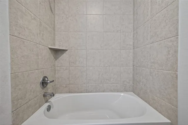 a bathroom with a sink and a bathtub