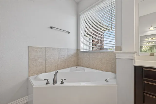 a sink with a mirror