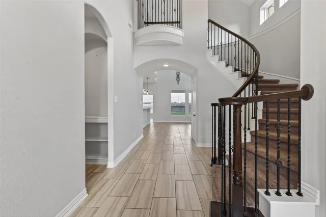 a view of entryway with wooden floor